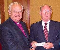 Mr Pat Naismith, winner of the parish website competition with the Primate