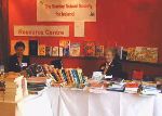 Olive Rhodes and Muriel Bryan on the Sunday School Society stand