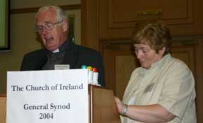 Rev Canon Cecil Hyland & Mrs Avril Forrest presenting the Report of the Commission on Ministry